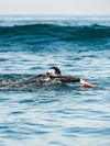 Swimmer in ocean wearing HYDROfive2 wetsuit