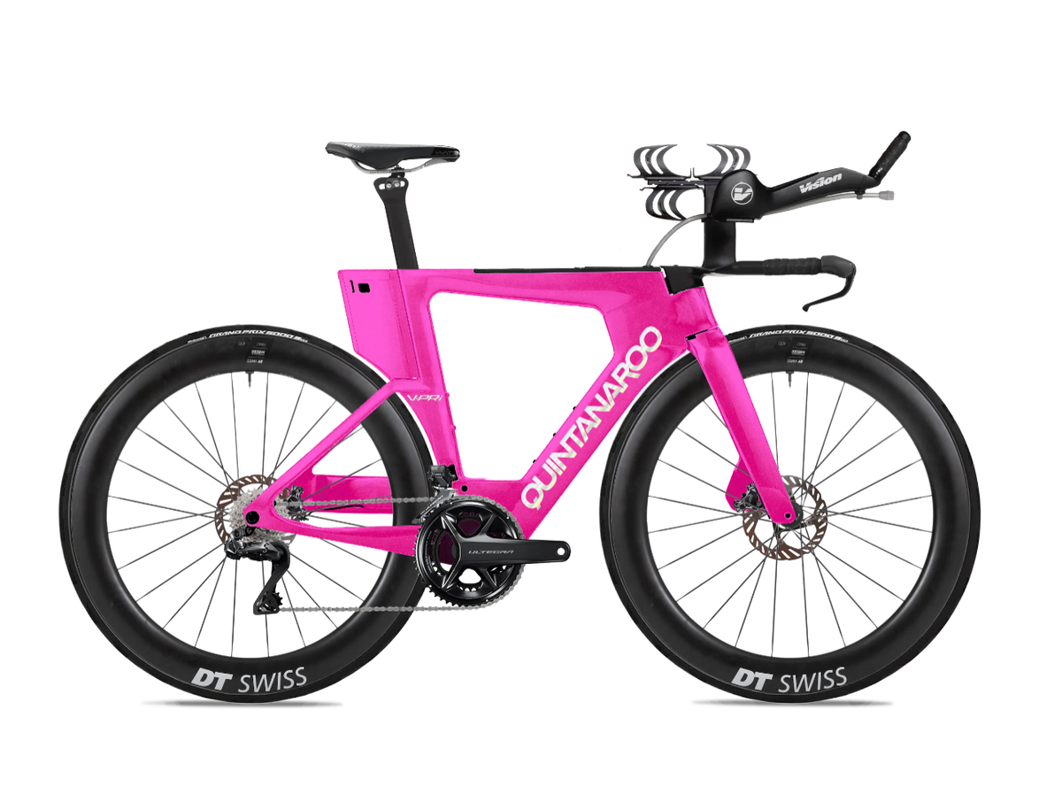 Pink bicycle with Quintana Roo branding on a white background