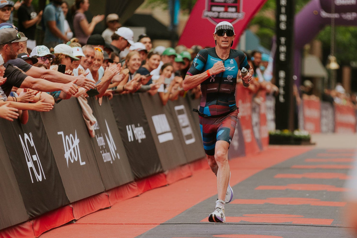 Ironman Finish line with runner