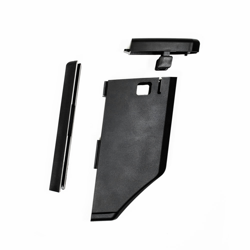 A raw black QBox storage system with QBox, lid, plastic slider, and mounting bolts for V-PRi frames.