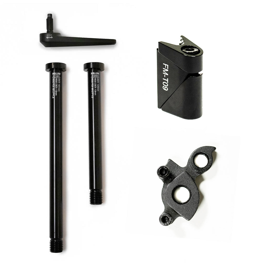 A collection of bicycle replacement parts including a rear derailleur dropout kit, a seatpost wedge, a removable axle handle, and a set of front and rear thru-axles, all laid out on a white background.